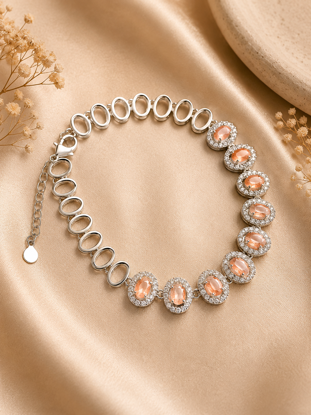 Silver Designer Bracelet with Peach Diamonds