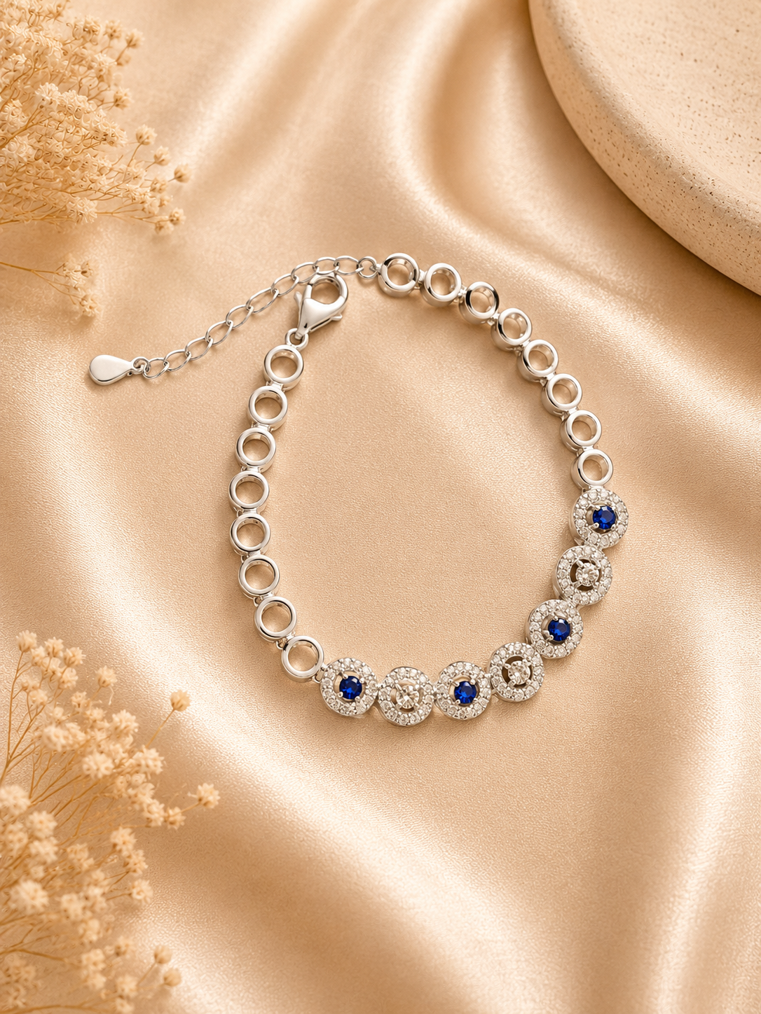 Silver Designer Bracelet with Blue Diamonds